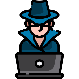 guy with trench coat and hat in front of laptop